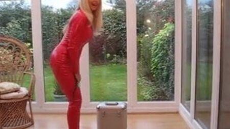 Tuta in PVC con inserti in PVC rosso