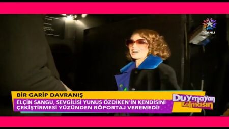 Elçin Sangu non ha potuto rilasciare un'intervista perché il suo fidanzato Yunus Özdiken la tirava per un braccio (480 x 854)